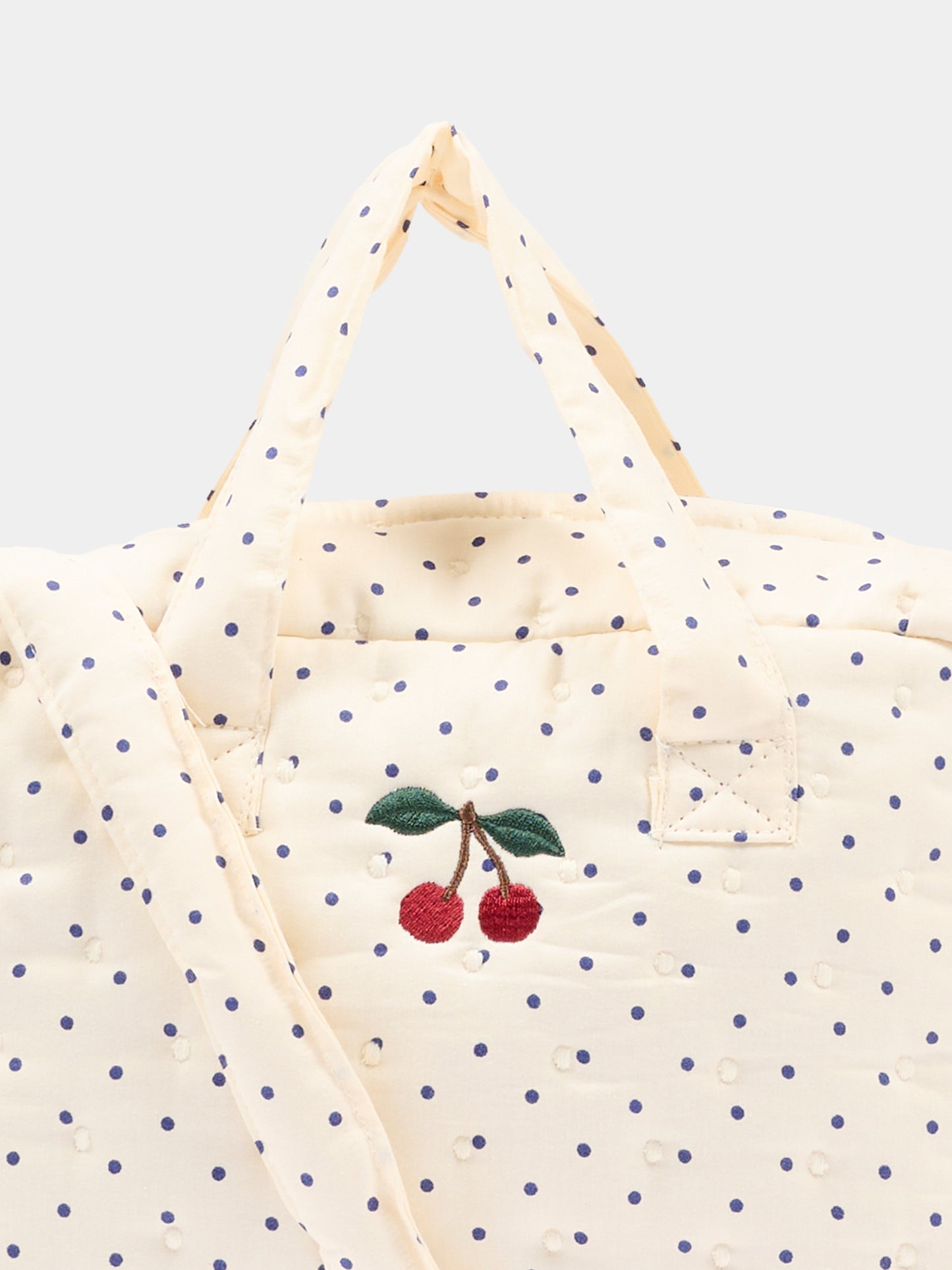 Ivory sensory play bag for girl with polka dots