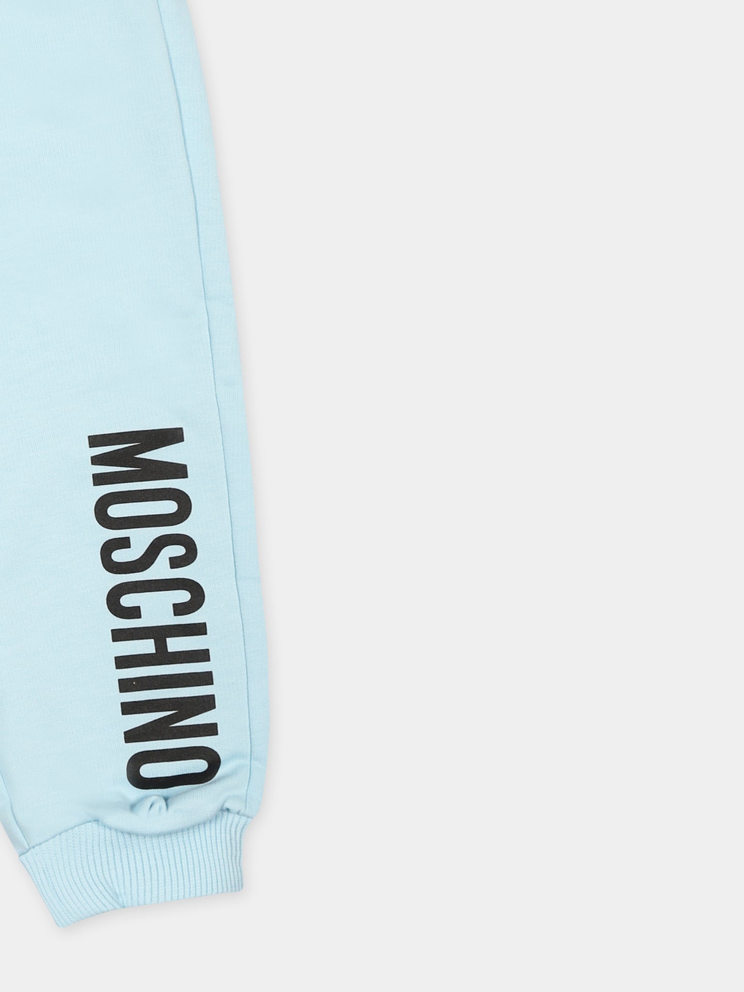 Light blue trousers for baby boy with logo