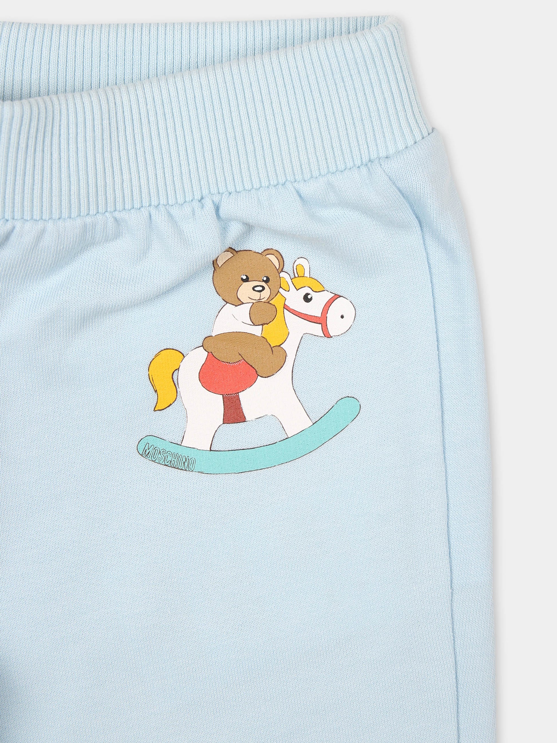 Pantaloni celesti per neonato con Teddy Bear e cavallo a dondolo,Moschino Kids,MOP03J LCA19 40304