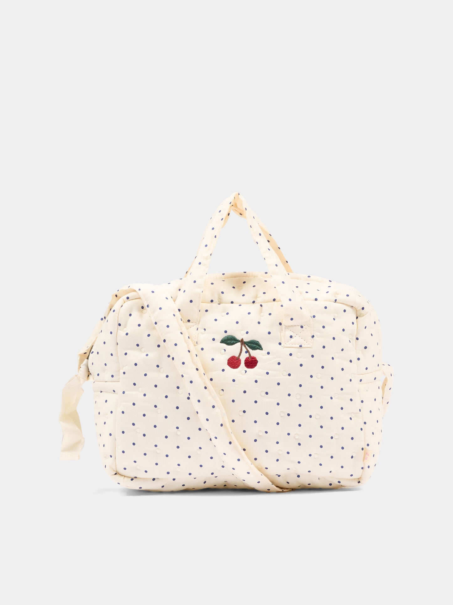 Ivory sensory play bag for girl with polka dots