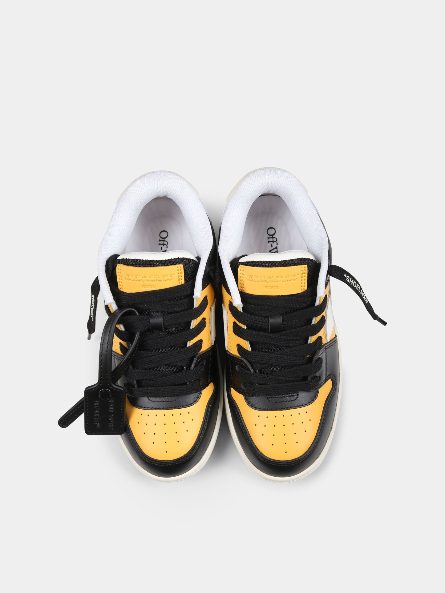 Yellow sneakers for boy with arrow