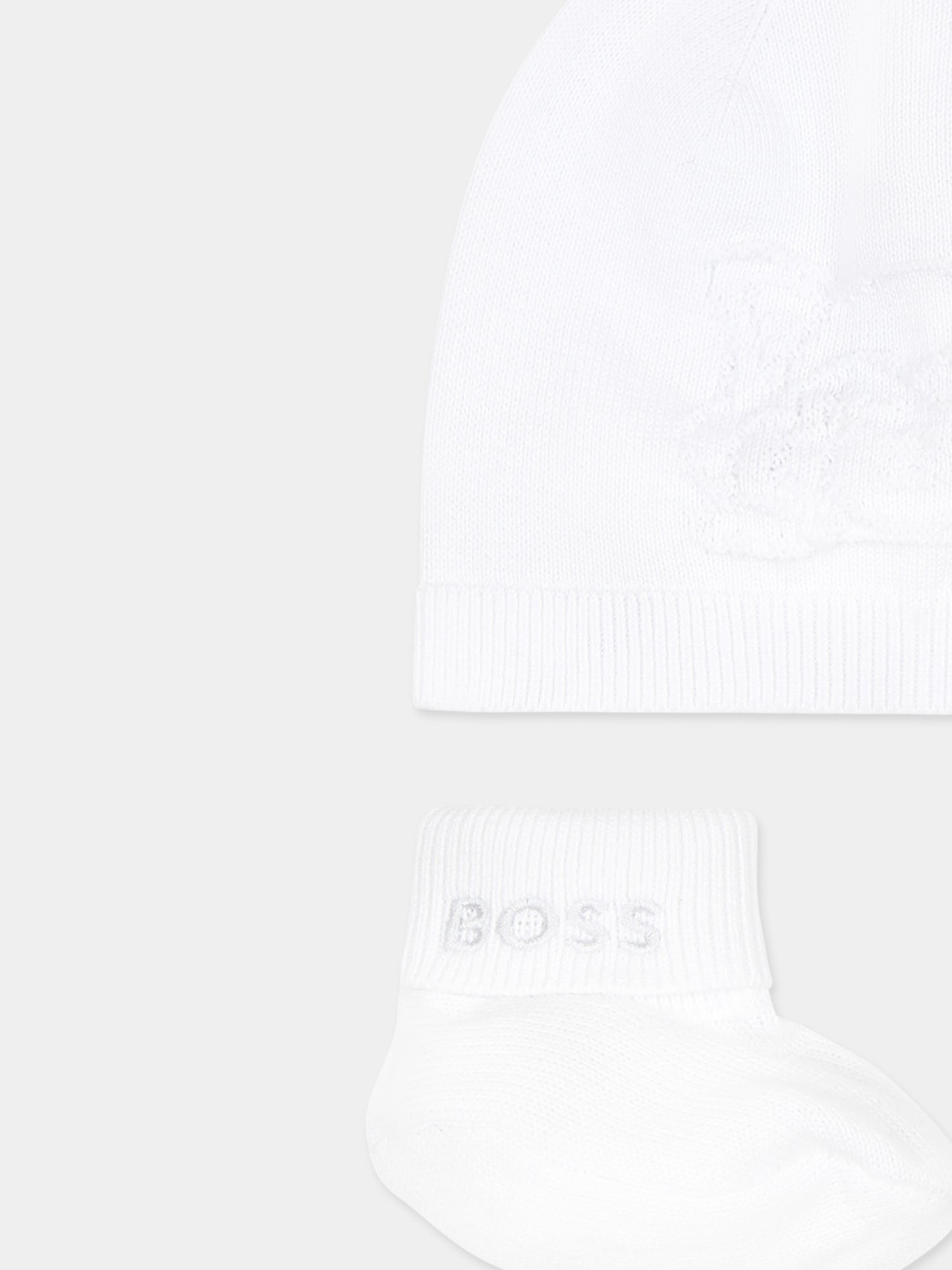 White accessory set for baby boy with logo