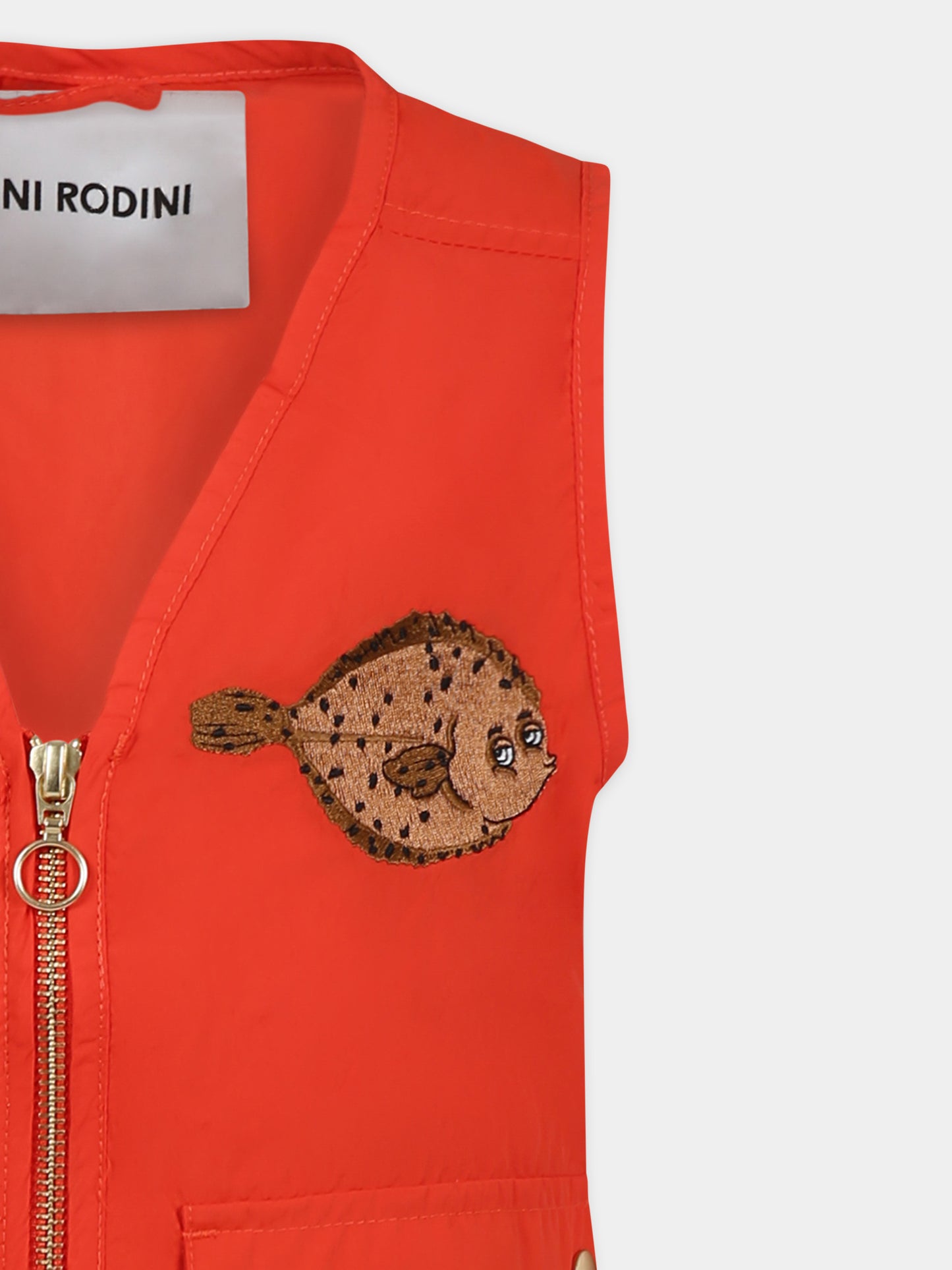 Orange vest for kids with puffer fish