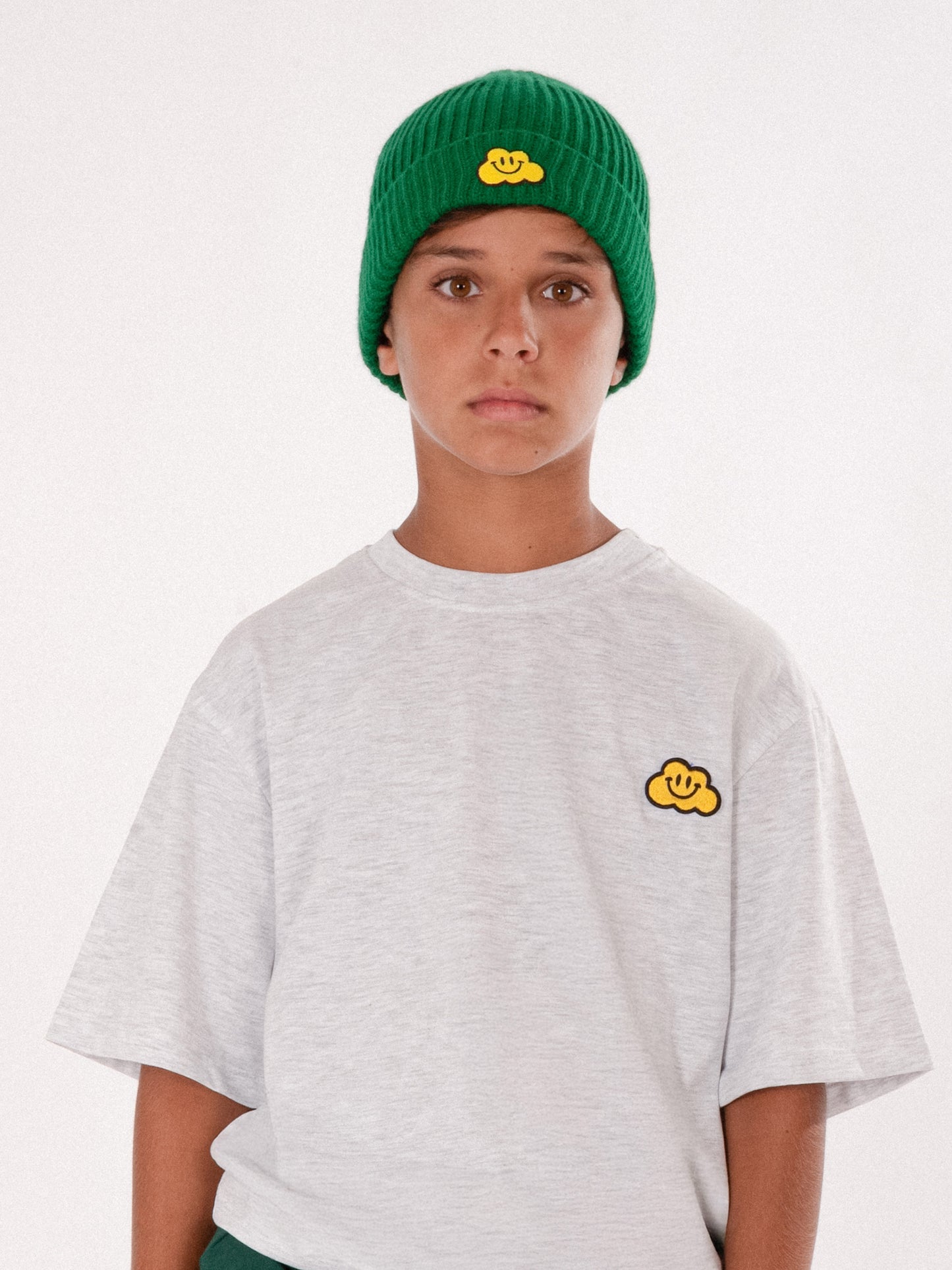 Green hat for kids with yellow cloud